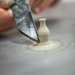 Jon French making smoe tiny pots